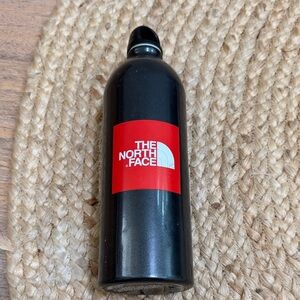 The North Face Black Water Bottle with Red Logo